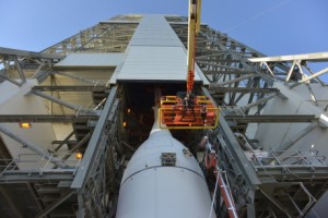 Photo Captions: The Orion spacecraft has been transported to launch pad 37 and has been lifted about 200 ft. to mate with the Delta IV Heavy rocket. Photo: Lockheed Martin.