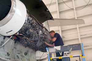 Aerospace - Mechanic Working on Engine Bizjet